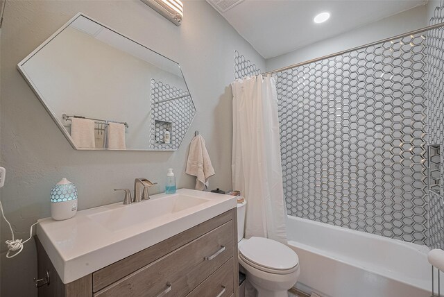4515 Briar Hollow Pl Unit 307, Houston, TX 77027 - full bathroom with shower / bath combo, toilet, and vanity