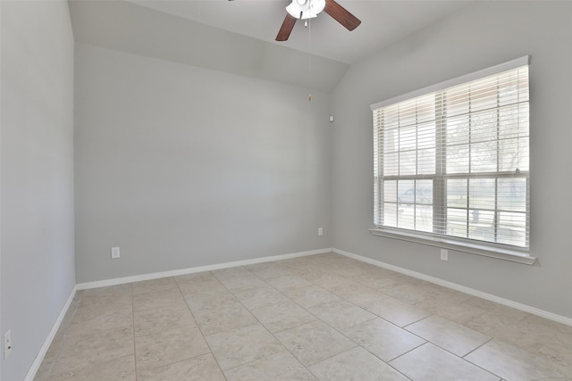 10014 Mahaffey Rd, Tomball, TX 77375 - unfurnished room featuring a ceiling fan, lofted ceiling, light tile patterned flooring, and baseboards