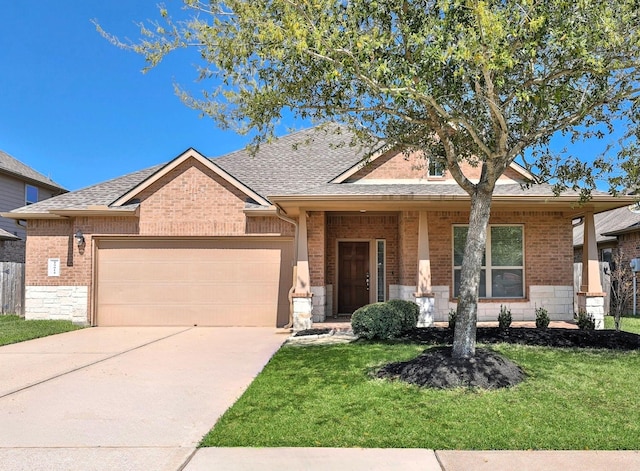 10014 Mahaffey Rd, Tomball, TX 77375 - view of front of house with an attached garage, a front lawn, concrete driveway, and brick siding