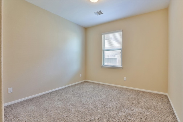 10014 Mahaffey Rd, Tomball, TX 77375 - carpeted spare room with baseboards