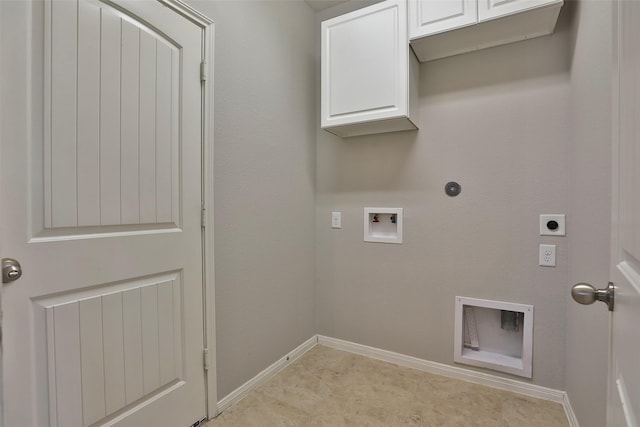 10014 Mahaffey Rd, Tomball, TX 77375 - laundry area featuring hookup for an electric dryer, washer hookup, baseboards, cabinet space, and hookup for a gas dryer