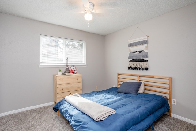 16014 Sweet Fern St, Houston, TX 77070 - bedroom featuring carpet flooring, a textured ceiling, baseboards, and ceiling fan