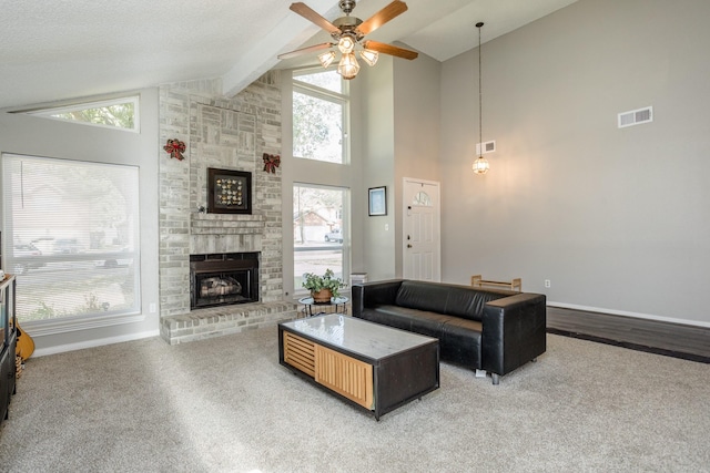 16014 Sweet Fern St, Houston, TX 77070 - living area with ceiling fan, a brick fireplace, light carpet, high vaulted ceiling, and baseboards