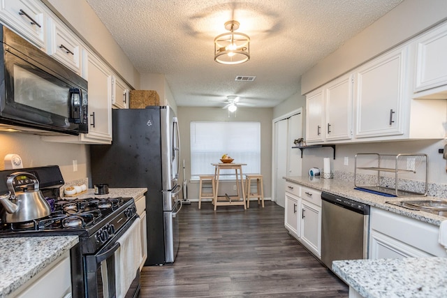 16014 Sweet Fern St, Houston, TX 77070 - kitchen featuring black appliances, a textured ceiling, white cabinetry, ceiling fan, and dark wood finished floors