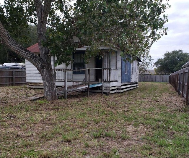 712 S Whitney, Aransas Pass, TX 78336 - rear view of property featuring a wooden deck