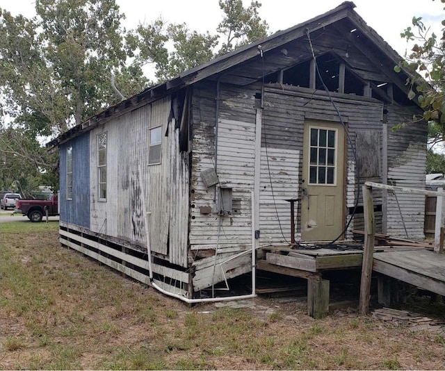 712 S Whitney, Aransas Pass, TX 78336 - back of property with a deck