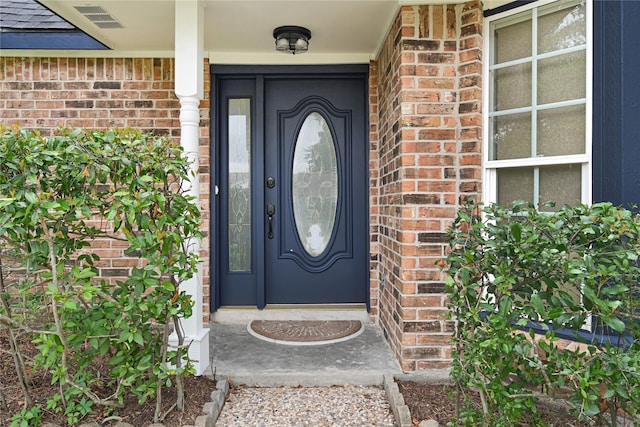 5815 Old Lodge Dr, Houston, TX 77066 - view of exterior entry featuring brick siding