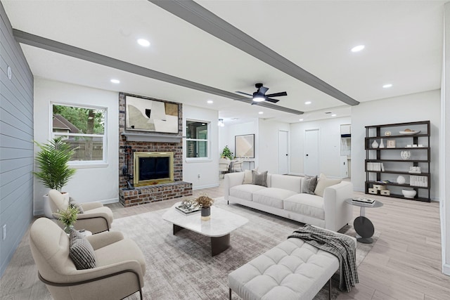 5815 Old Lodge Dr, Houston, TX 77066 - living room with light wood-type flooring, recessed lighting, beam ceiling, a fireplace, and a ceiling fan