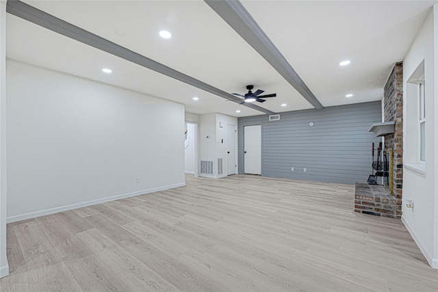5815 Old Lodge Dr, Houston, TX 77066 - unfurnished living room with light wood-style flooring, ceiling fan, baseboards, recessed lighting, and beamed ceiling