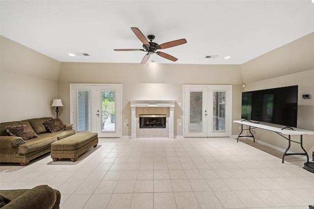 20103 Faye St, Tomball, TX 77377 - living room with baseboards, french doors, a ceiling fan, a fireplace, and recessed lighting