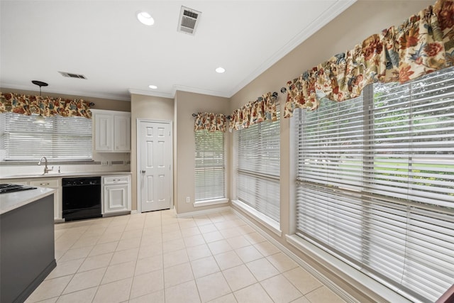 20103 Faye St, Tomball, TX 77377 - kitchen featuring light countertops, ornamental molding, black appliances, light tile patterned floors, and recessed lighting