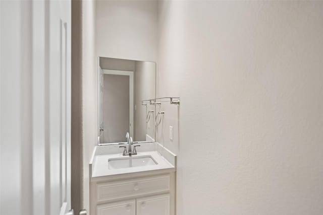 20103 Faye St, Tomball, TX 77377 - bathroom featuring vanity and a textured wall