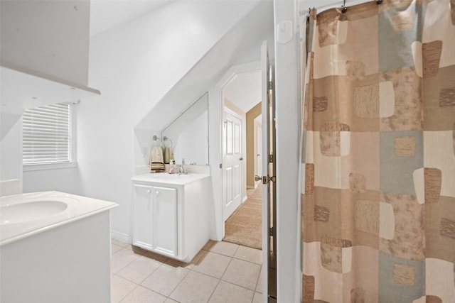 20103 Faye St, Tomball, TX 77377 - full bathroom with tile patterned flooring, two vanities, a stall shower, and baseboards