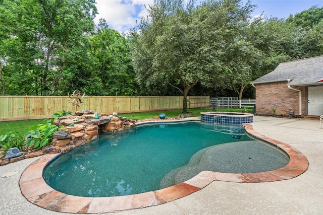 20103 Faye St, Tomball, TX 77377 - view of swimming pool with a fenced backyard, a patio area, and a pool with connected hot tub