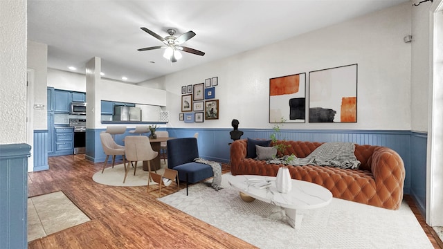 2121 El Paseo St Unit 1511, Houston, TX 77054 - living area featuring wood finished floors, wainscoting, a ceiling fan, and recessed lighting