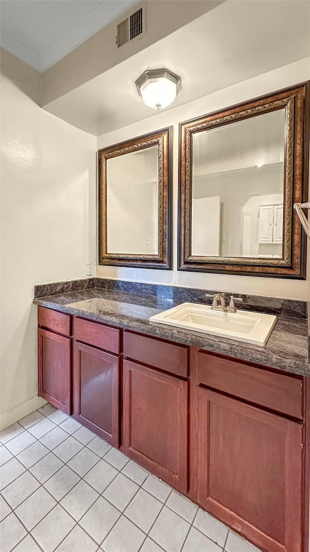 2121 El Paseo St Unit 1511, Houston, TX 77054 - bathroom featuring double vanity and tile patterned floors