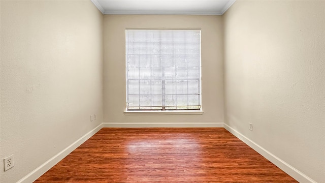2121 El Paseo St Unit 1511, Houston, TX 77054 - unfurnished room with ornamental molding, baseboards, and wood finished floors