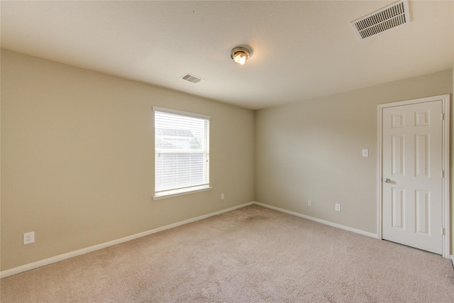 2831 Lake Villa Dr, Missouri City, TX 77459 - carpeted empty room featuring baseboards