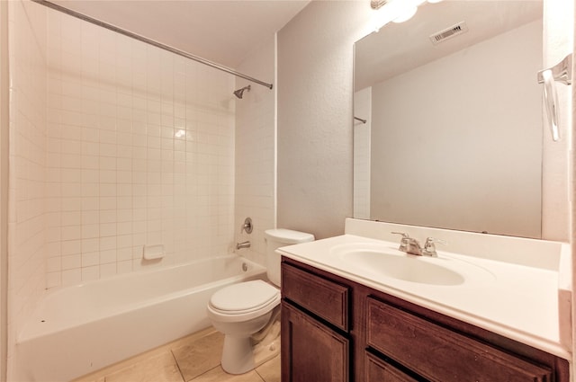 2831 Lake Villa Dr, Missouri City, TX 77459 - full bath with tile patterned flooring, toilet, washtub / shower combination, and vanity