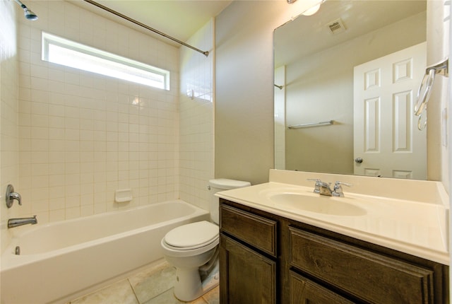 2831 Lake Villa Dr, Missouri City, TX 77459 - bathroom featuring toilet, shower / bath combination, tile patterned flooring, and vanity