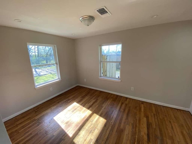 7209 La Salette St, Houston, TX 77021 - unfurnished room featuring baseboards and wood finished floors