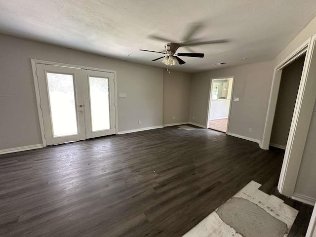 7209 La Salette St, Houston, TX 77021 - unfurnished living room featuring a ceiling fan, french doors, baseboards, and dark wood finished floors