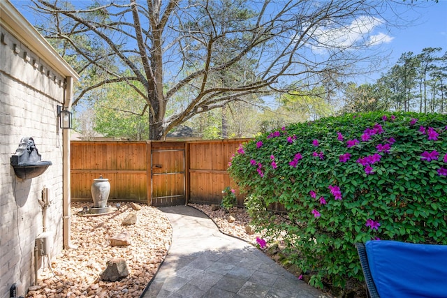 3114 Breezy Pines Ct, Kingwood, TX 77339 - view of patio / terrace featuring a gate and fence