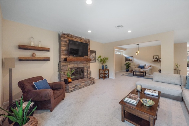 3114 Breezy Pines Ct, Kingwood, TX 77339 - living room with carpet floors, recessed lighting, a stone fireplace, and baseboards