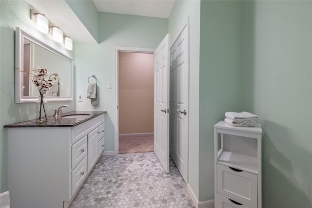 3114 Breezy Pines Ct, Kingwood, TX 77339 - bathroom with vanity and baseboards