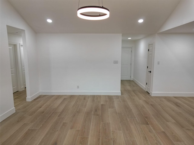 2225 W Clare St, Deer Park, TX 77536 - spare room with light wood-style flooring, baseboards, and recessed lighting