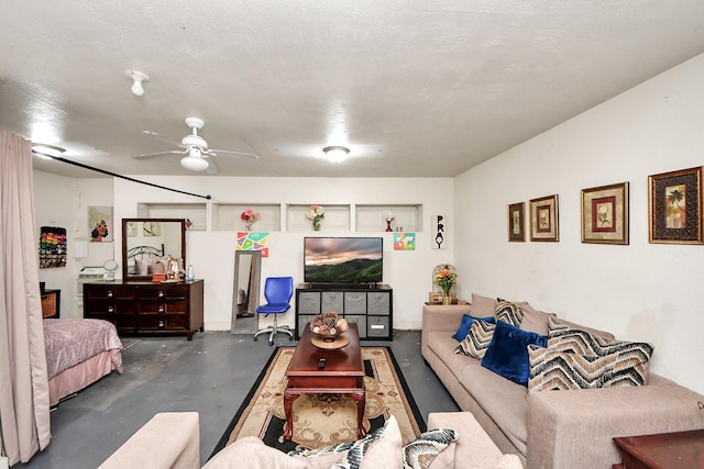 4155 Amir St, Houston, TX 77072 - living area with finished concrete flooring and a ceiling fan