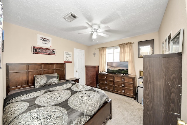 4155 Amir St, Houston, TX 77072 - carpeted bedroom with a ceiling fan and a textured ceiling