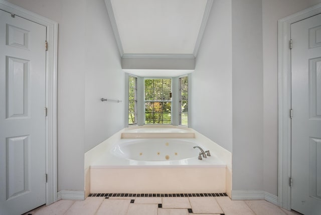 4910 Glen Hollow St, Sugar Land, TX 77479 - full bath with a whirlpool tub, ornamental molding, tile patterned floors, and baseboards