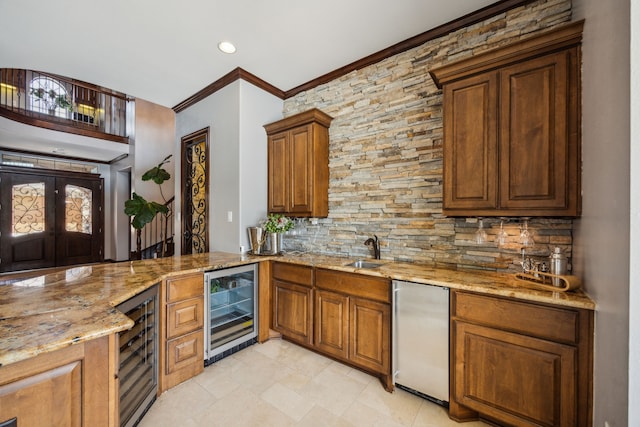 2919 Auburn Path, Sugar Land, TX 77479 - indoor wet bar with wine cooler, refrigerator, decorative backsplash, recessed lighting, and ornamental molding