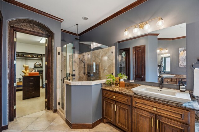 2919 Auburn Path, Sugar Land, TX 77479 - bathroom featuring crown molding, a stall shower, tile patterned flooring, and vanity