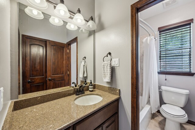 2919 Auburn Path, Sugar Land, TX 77479 - bathroom with toilet, vanity, and shower / tub combo