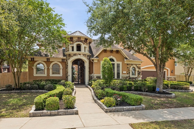 2919 Auburn Path, Sugar Land, TX 77479 - mediterranean / spanish-style home featuring stucco siding and stone siding