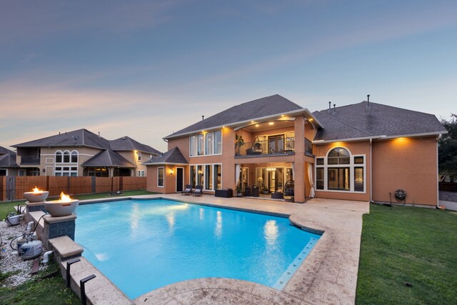 2919 Auburn Path, Sugar Land, TX 77479 - view of swimming pool with a patio area and an outdoor fire pit