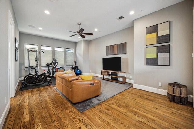 216 W Drew St, Houston, TX 77006 - living room featuring wood finished floors, recessed lighting, baseboards, and a ceiling fan