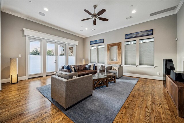 216 W Drew St, Houston, TX 77006 - living room with crown molding, a ceiling fan, wood finished floors, baseboards, and french doors