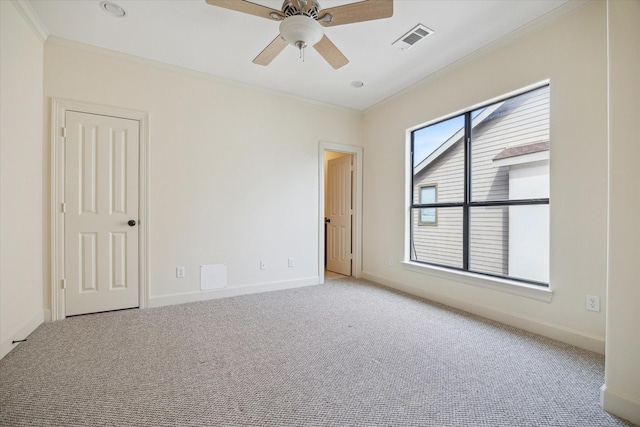 415 Tuam St, Houston, TX 77006 - spare room with ornamental molding, carpet floors, ceiling fan, and baseboards
