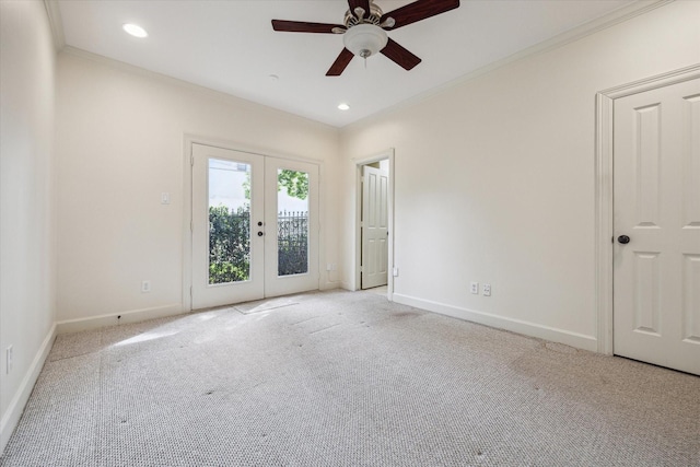 415 Tuam St, Houston, TX 77006 - empty room featuring french doors, crown molding, carpet, baseboards, and a ceiling fan