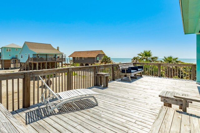 12881 Coronado Dr, Freeport, TX 77541 - wooden deck with a water view