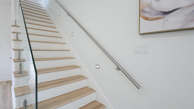 7805 Avenue Ave E, Houston, TX 77012 - stairway with wood finished floors
