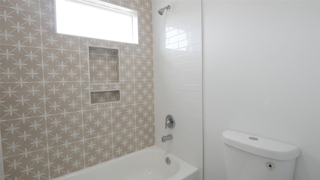 7805 Avenue Ave E, Houston, TX 77012 - bathroom featuring toilet and tub / shower combination