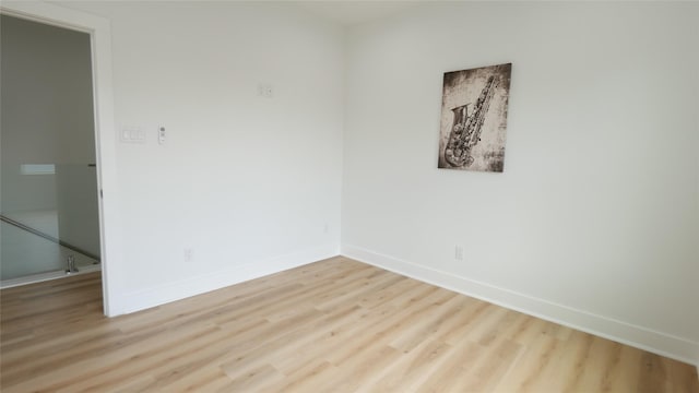 7805 Avenue Ave E, Houston, TX 77012 - spare room featuring wood finished floors and baseboards
