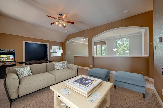 3307 Big Sky Pass, Missouri City, TX 77459 - living area with light carpet, ceiling fan, arched walkways, and baseboards