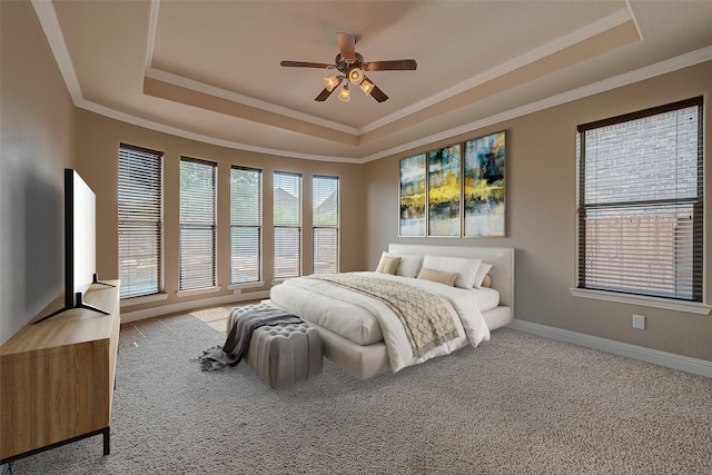 3307 Big Sky Pass, Missouri City, TX 77459 - bedroom featuring a tray ceiling, carpet, ornamental molding, baseboards, and a ceiling fan