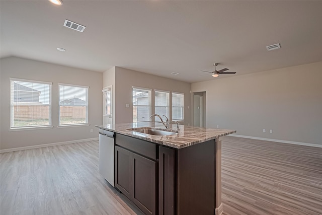 27315 Blue Pool Dr, Katy, TX 77493 - kitchen featuring open floor plan, dishwasher, light wood-type flooring, recessed lighting, and lofted ceiling