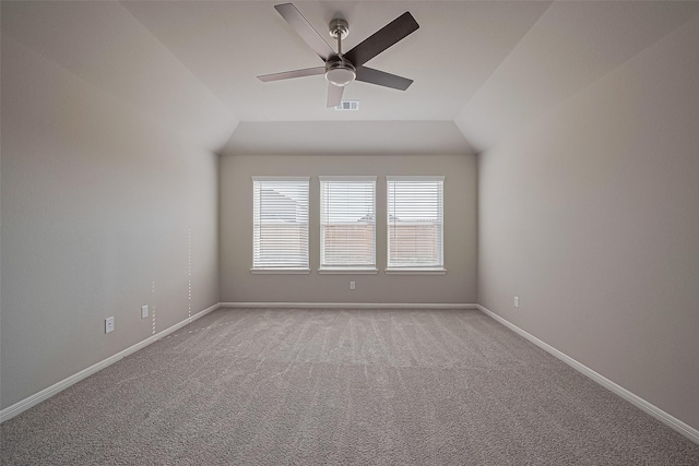 27315 Blue Pool Dr, Katy, TX 77493 - spare room featuring ceiling fan, light carpet, baseboards, and lofted ceiling